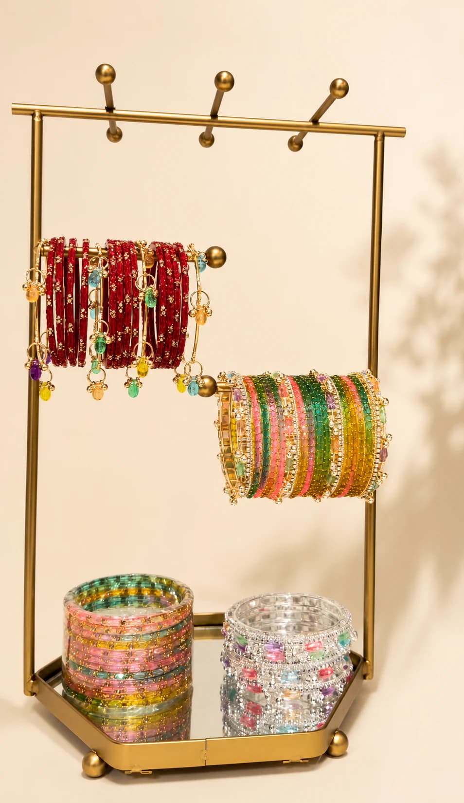 Full display view of the emerald, pastel and crimson bangle collection
