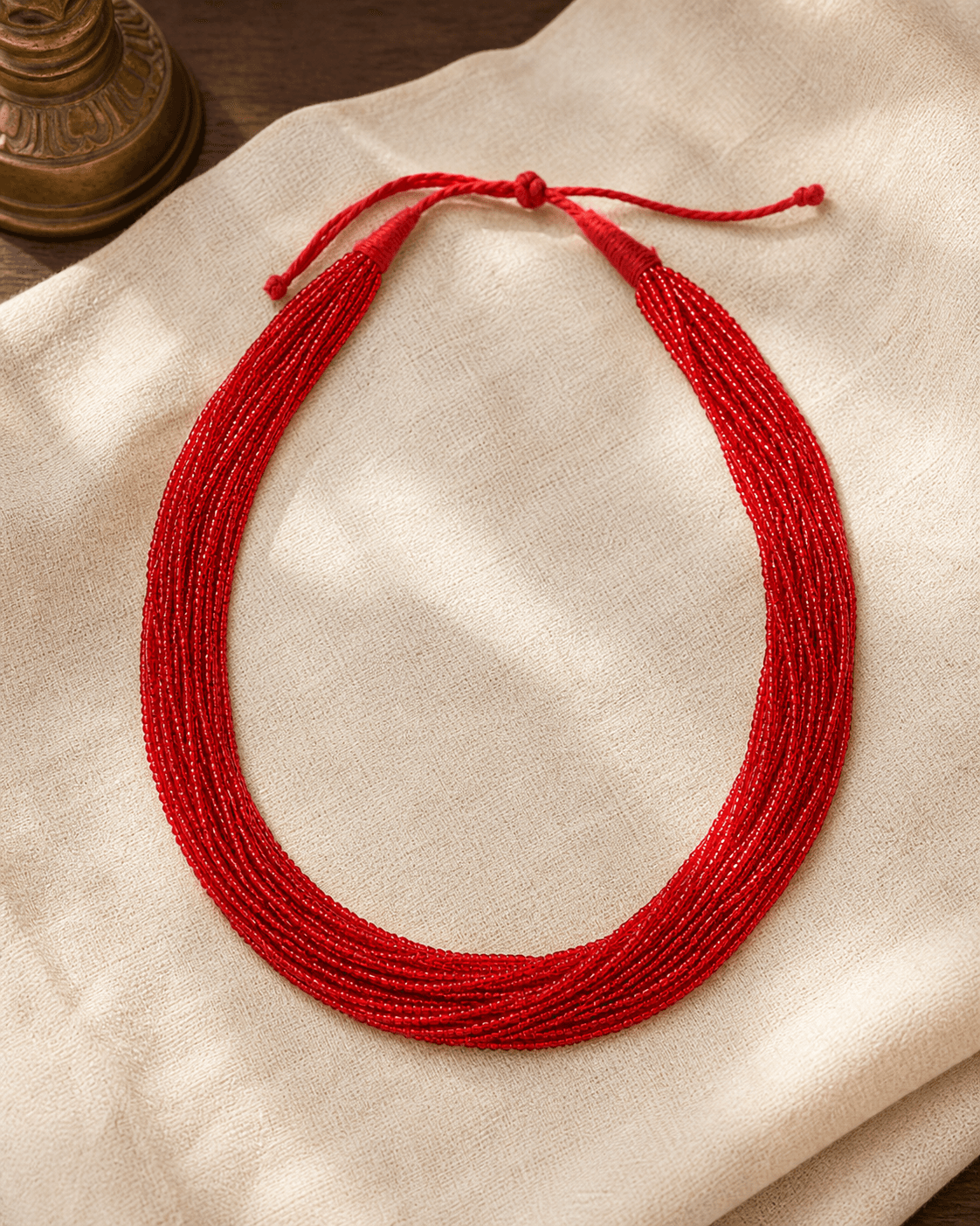 Multi-strand traditional vermillion red glass potey necklace