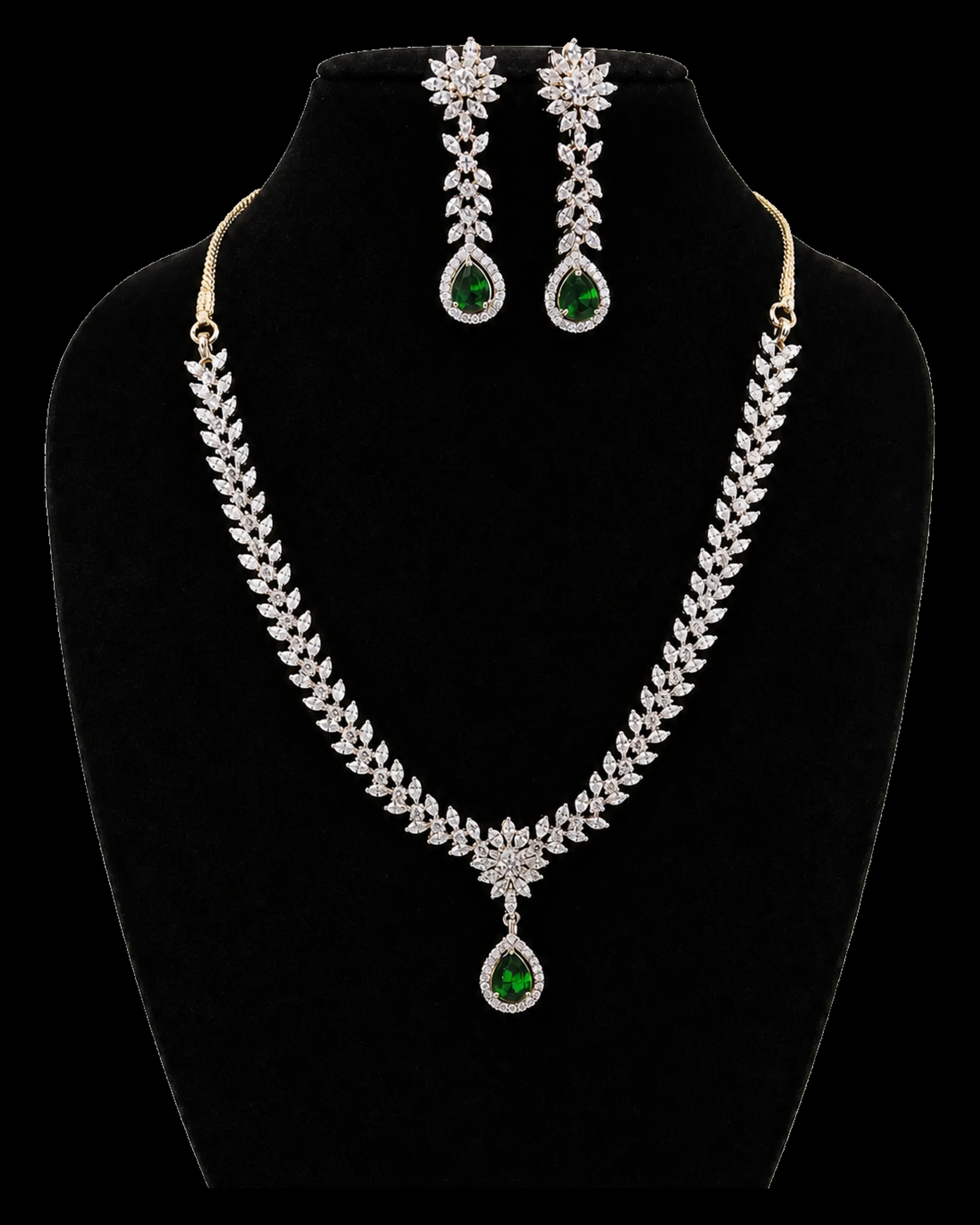 Crystal necklace and matching drop earrings with deep green stones