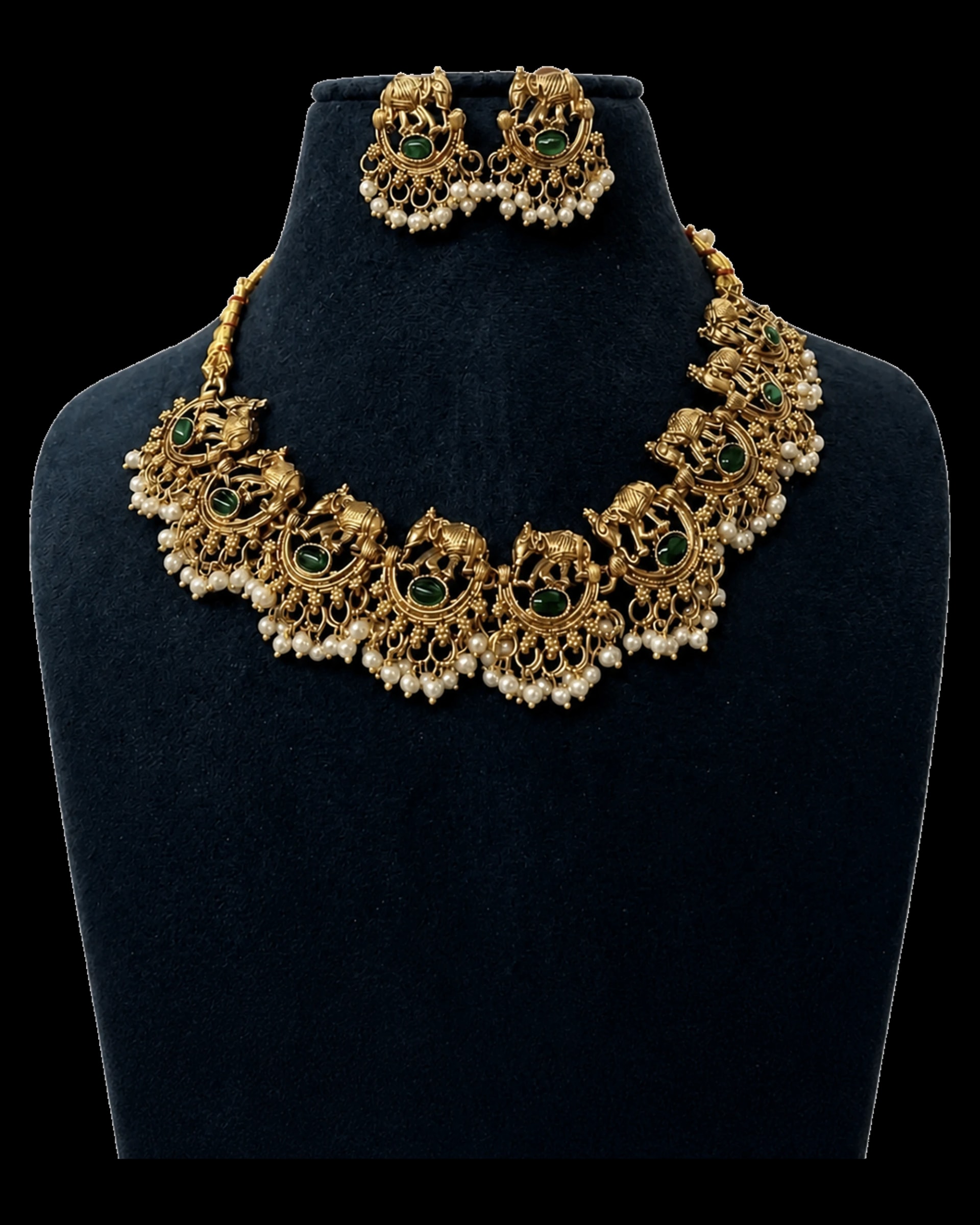 Elephant motif temple necklace with green stones, pearl accents and matching earrings