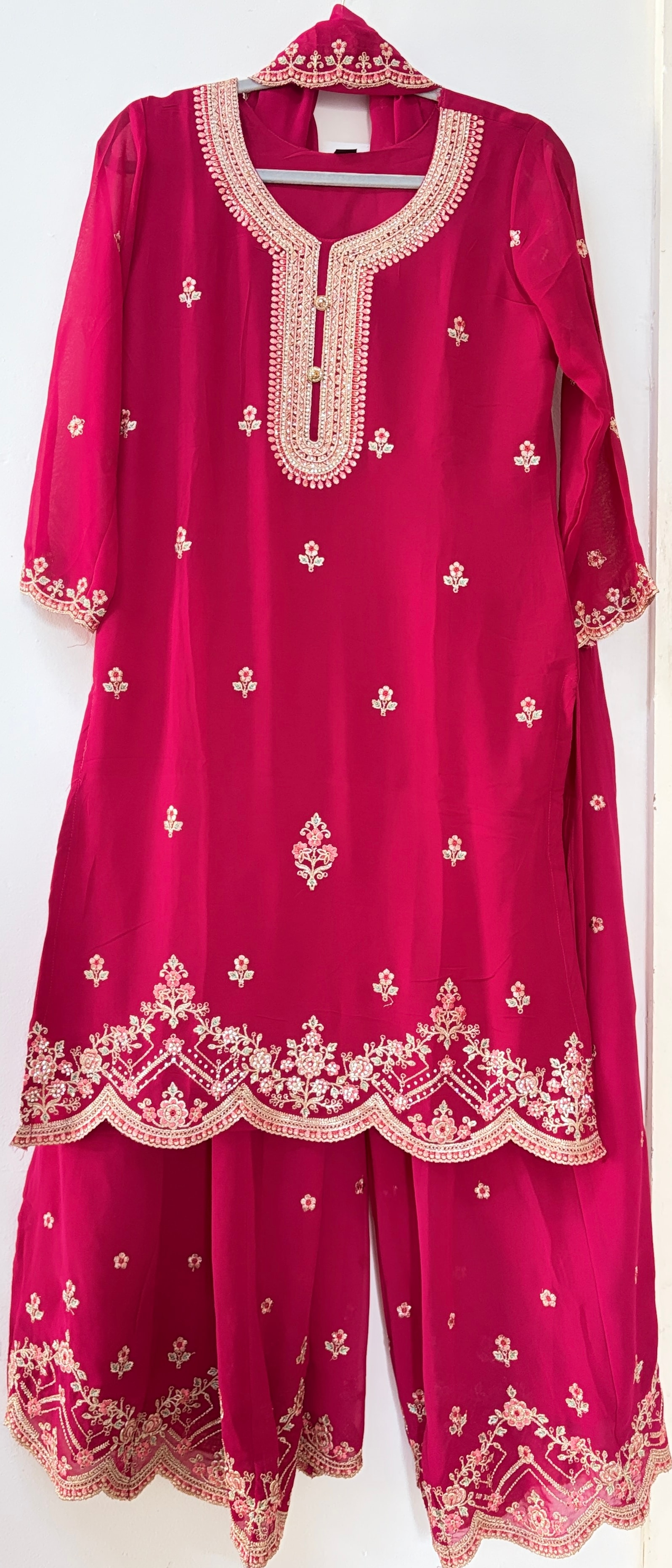 Original fuchsia three-piece set with pink and green floral embroidery, matching trousers and dupatta