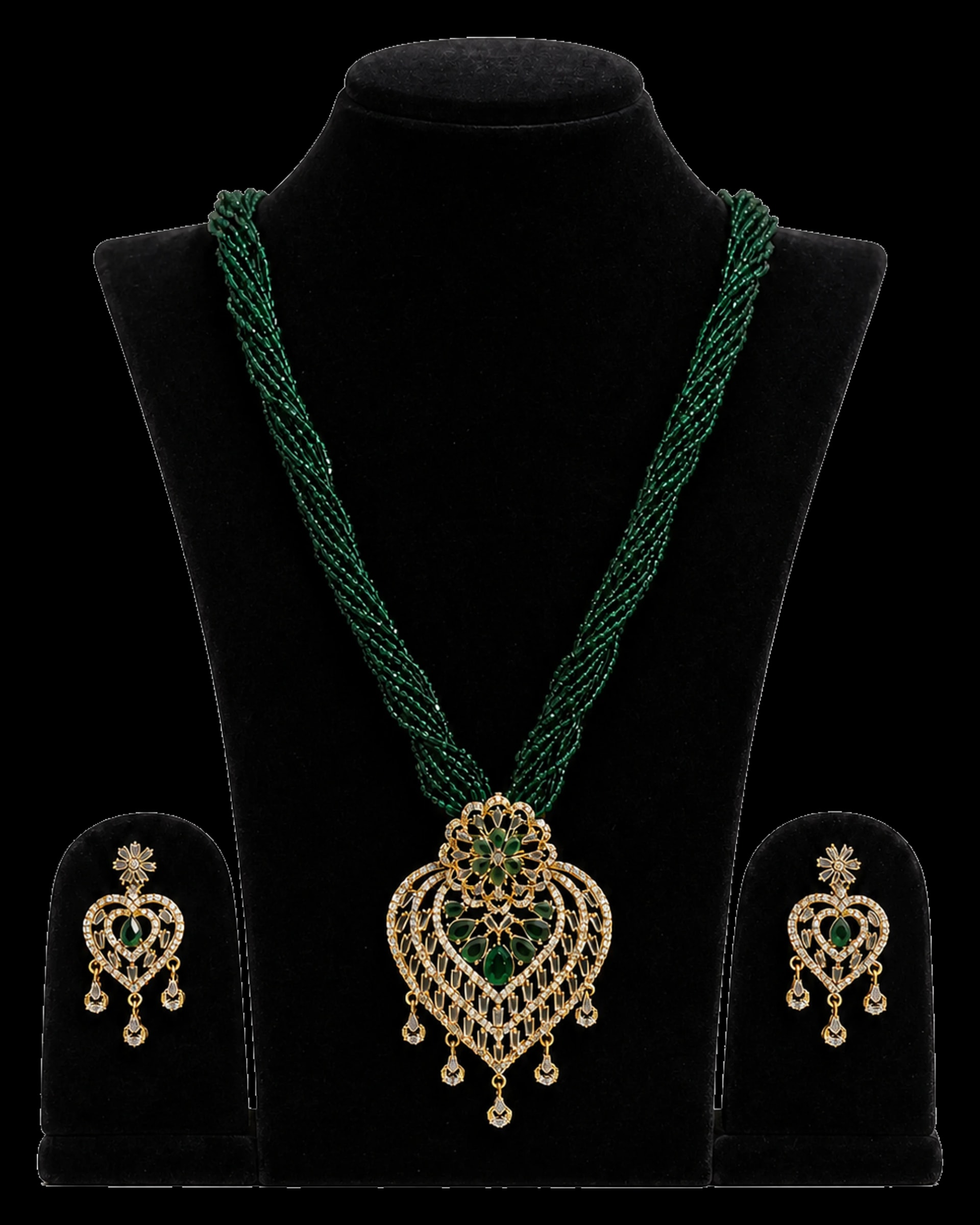 Green multi-strand necklace with an ornate pendant and matching earrings