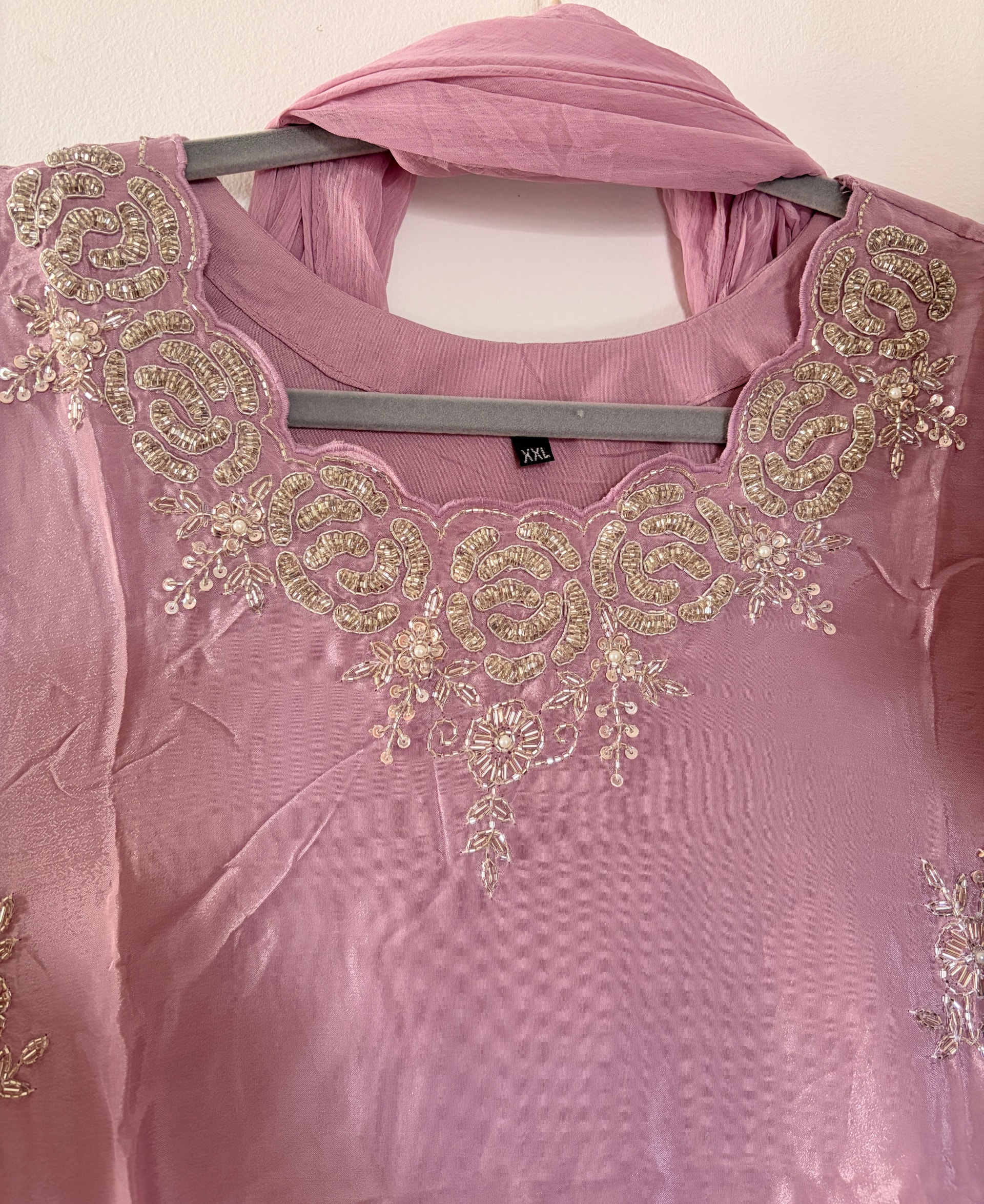 Original broad mauve paisley neckline and spaced floral embroidery