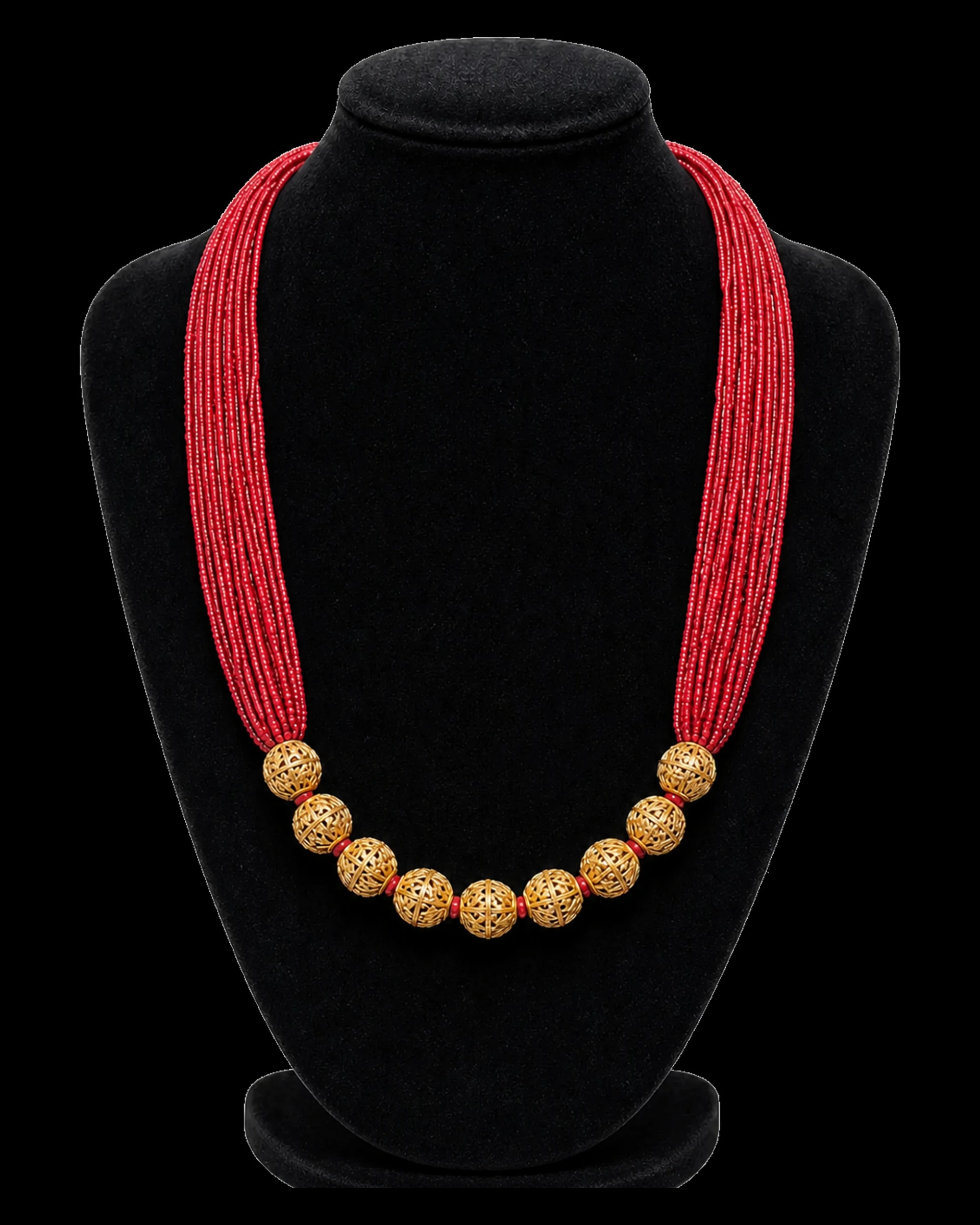 Traditional red Naugedi necklace with nine gold-tone beads on a black velvet bust
