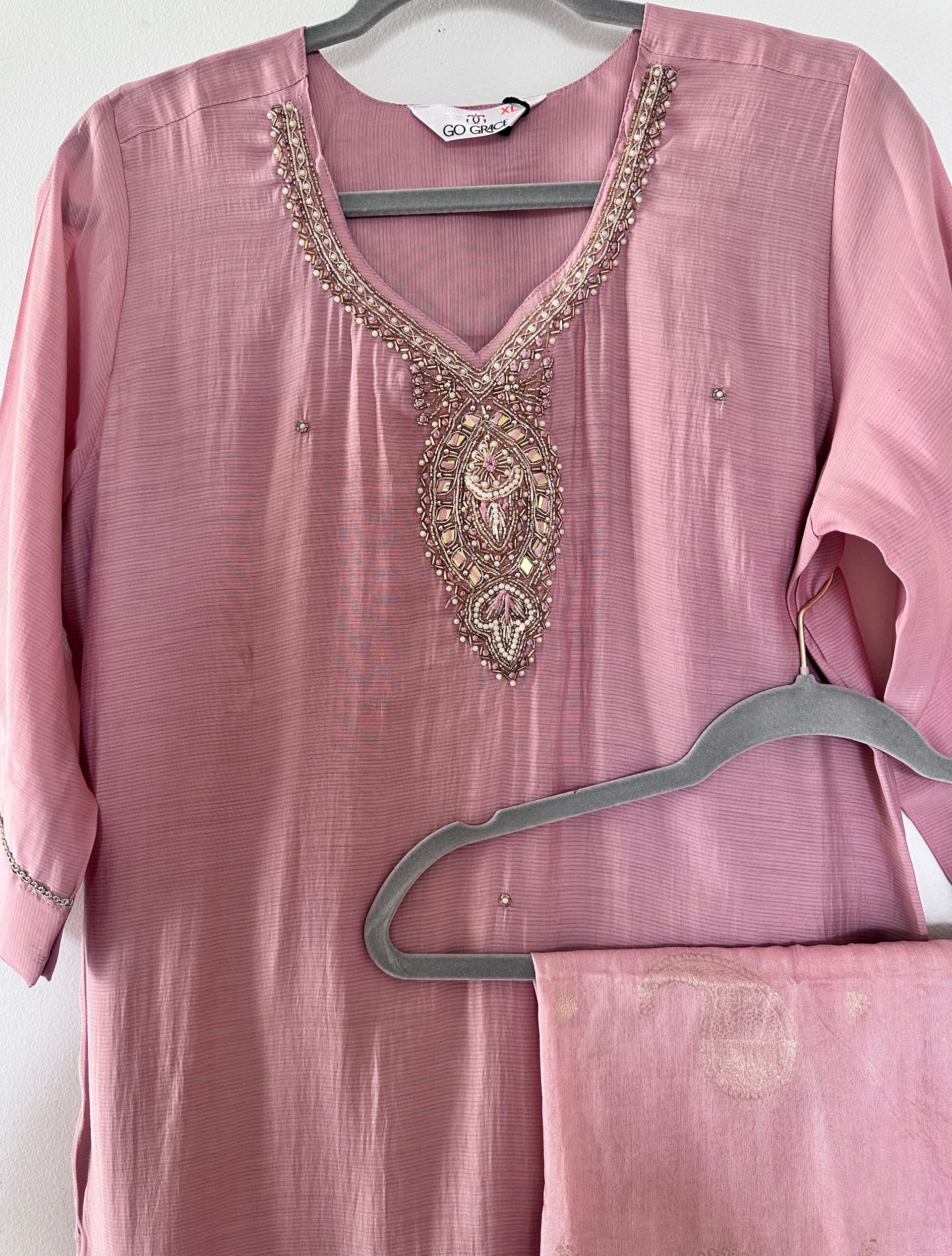 Original rose pink V neckline with its elongated metallic and bead paisley motif