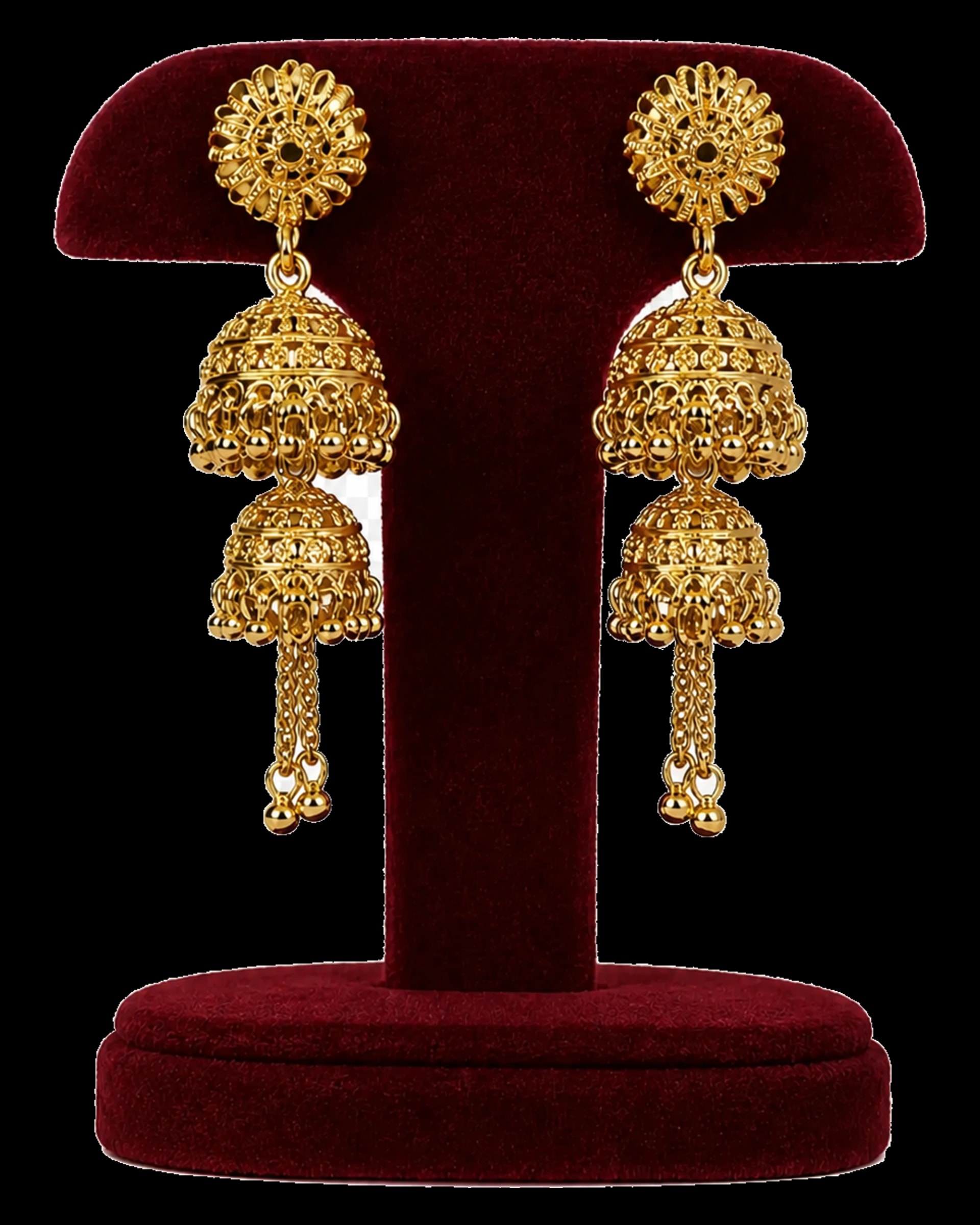 Pair of long warm-tone earrings with two tiered bell drops
