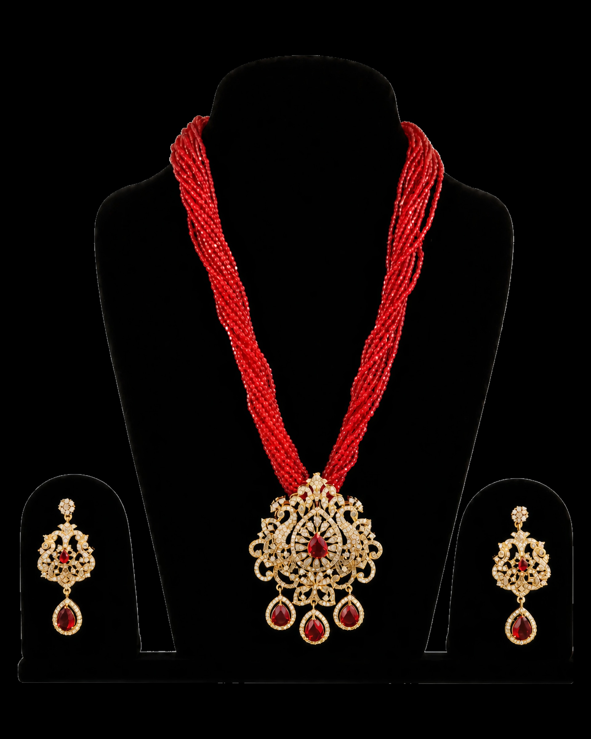A red potey necklace with fine bead strands, an openwork pendant and matching drop earrings.