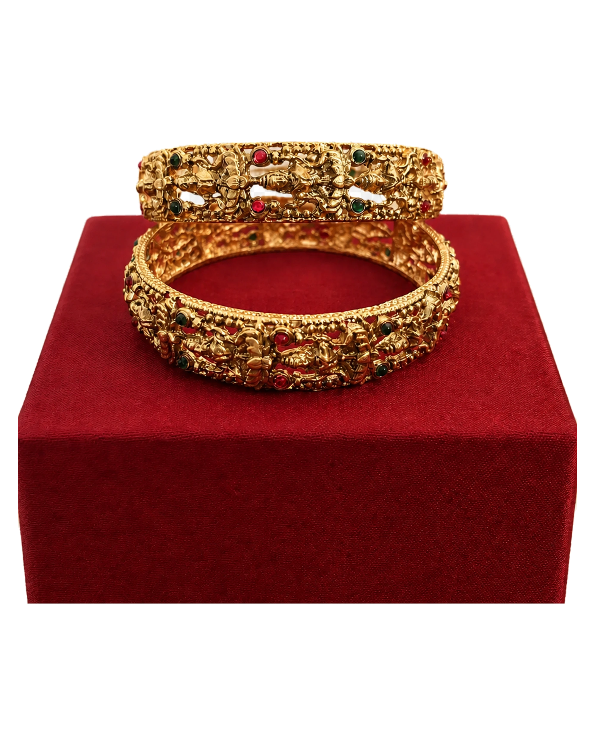 Ornate traditional bangle pair with raised relief and red and green details